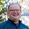 headshot of  Joe  Torrence 
